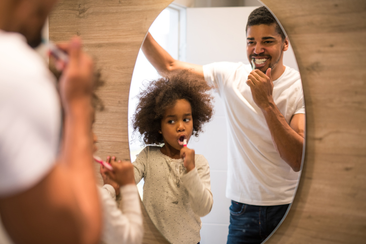 Brushing teeth with dad